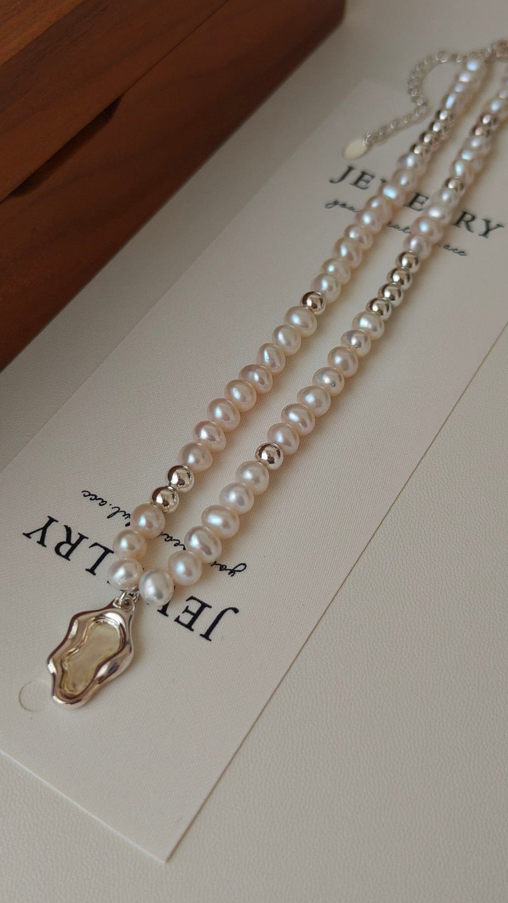 Silver-Tone Pearl Necklace Nature-Inspired Elegance with Mountain Design